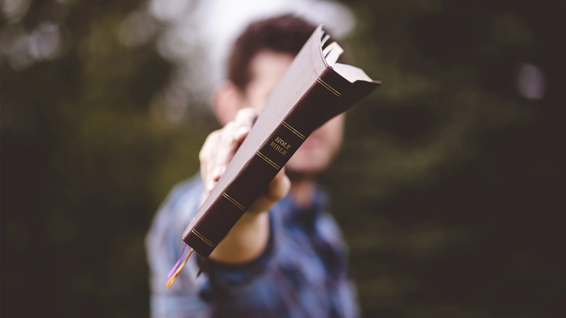 standing-holding-book-hands