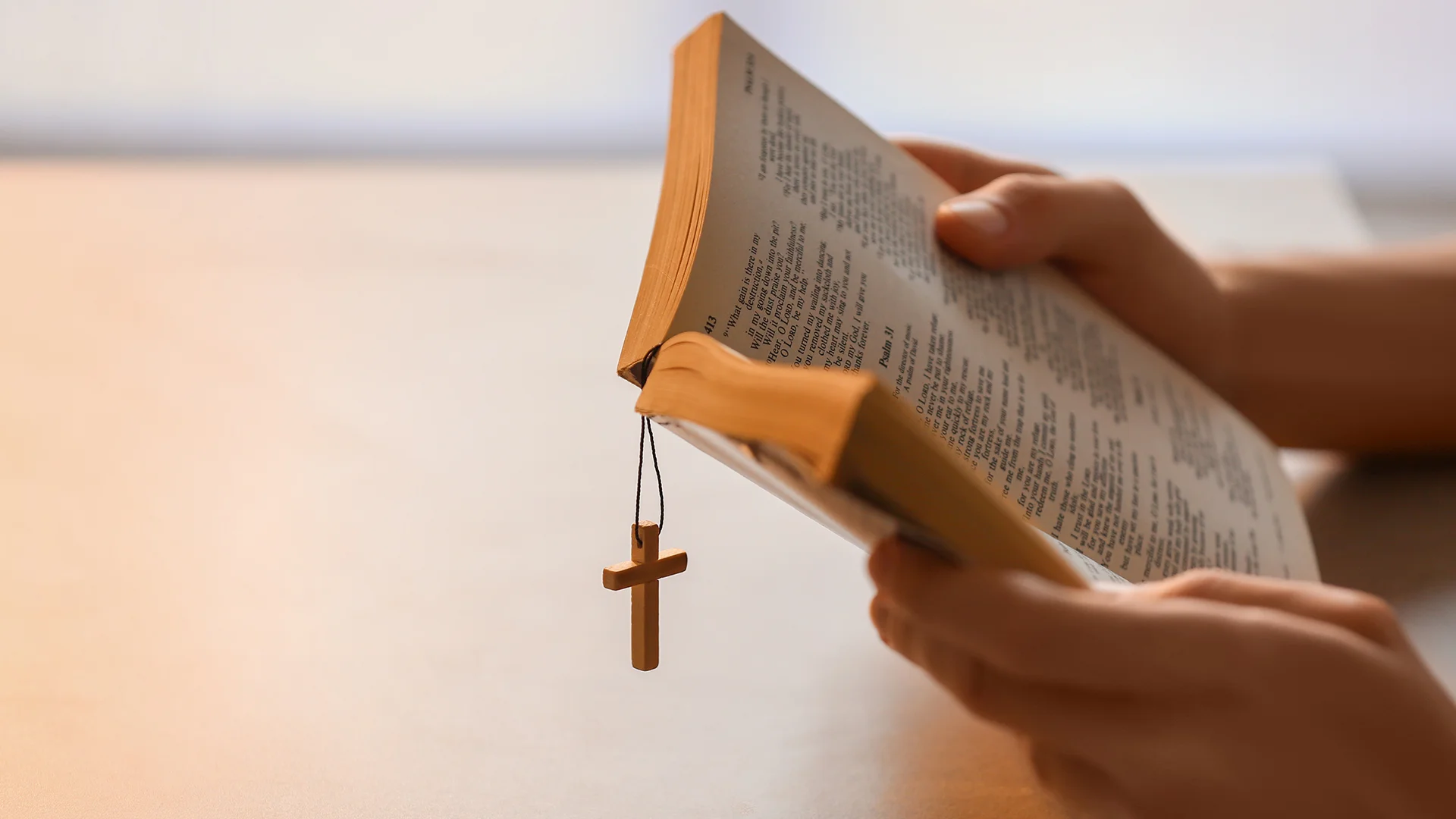 religious man reading Bible at home