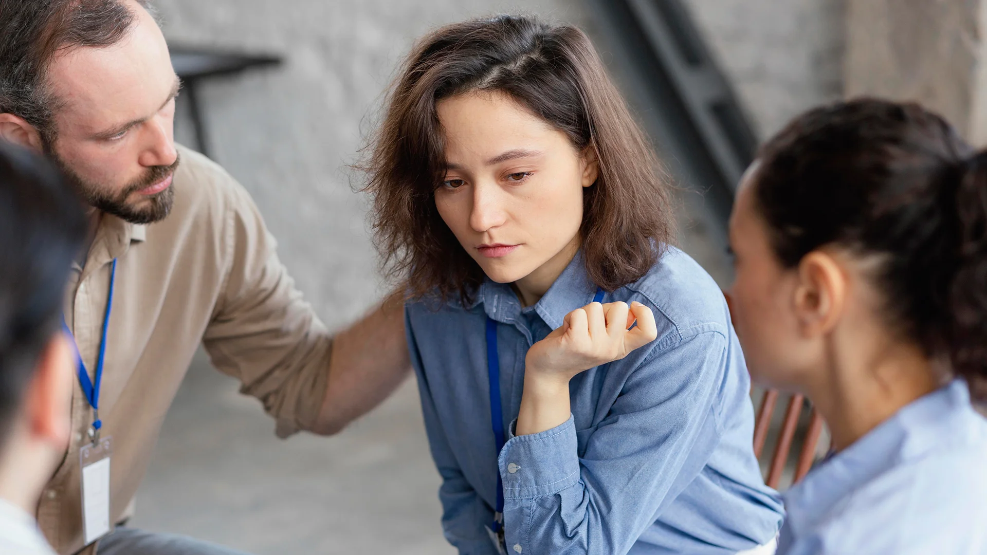 people discussing in therapy