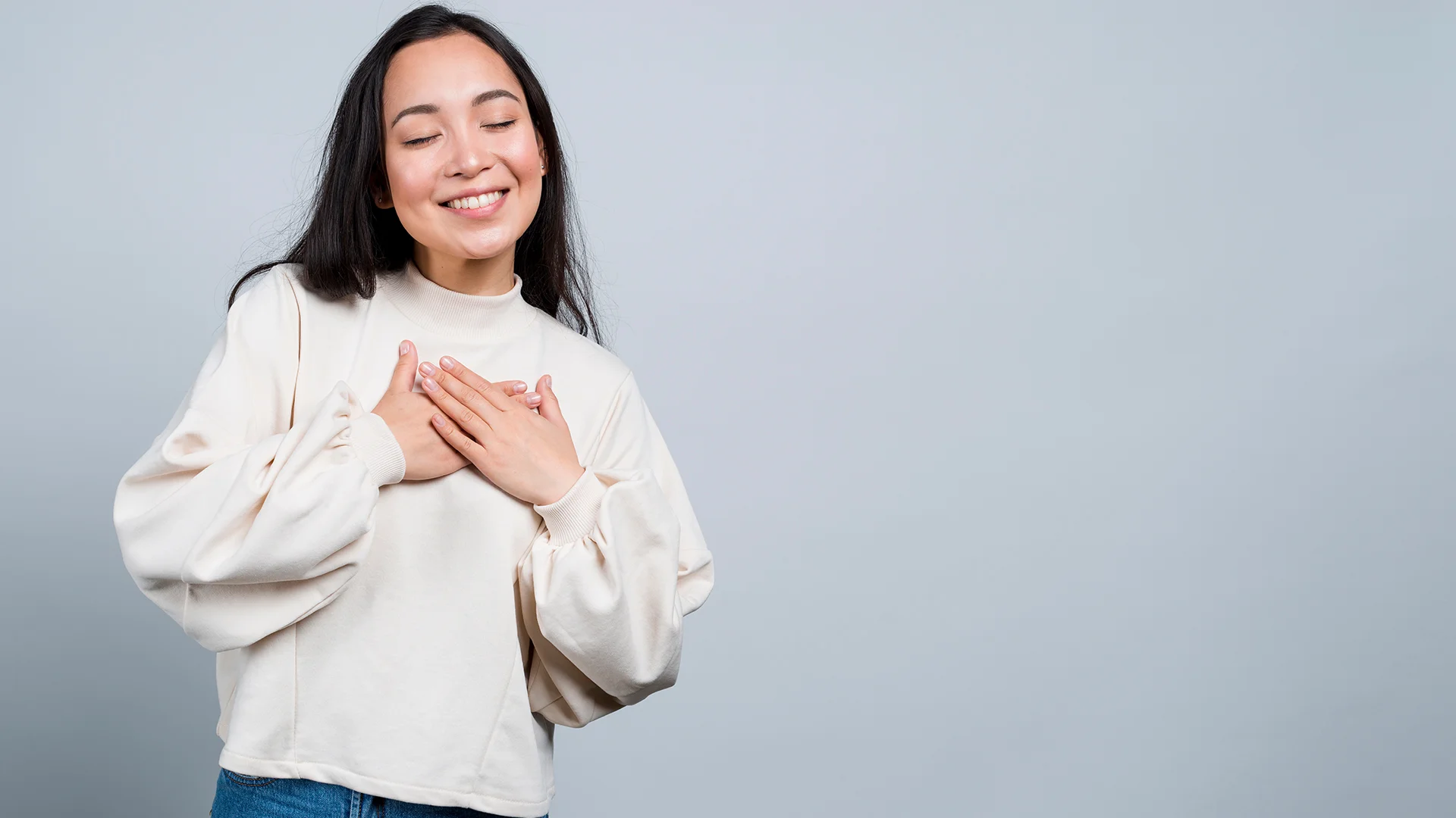 Happy mindful thankful young woman