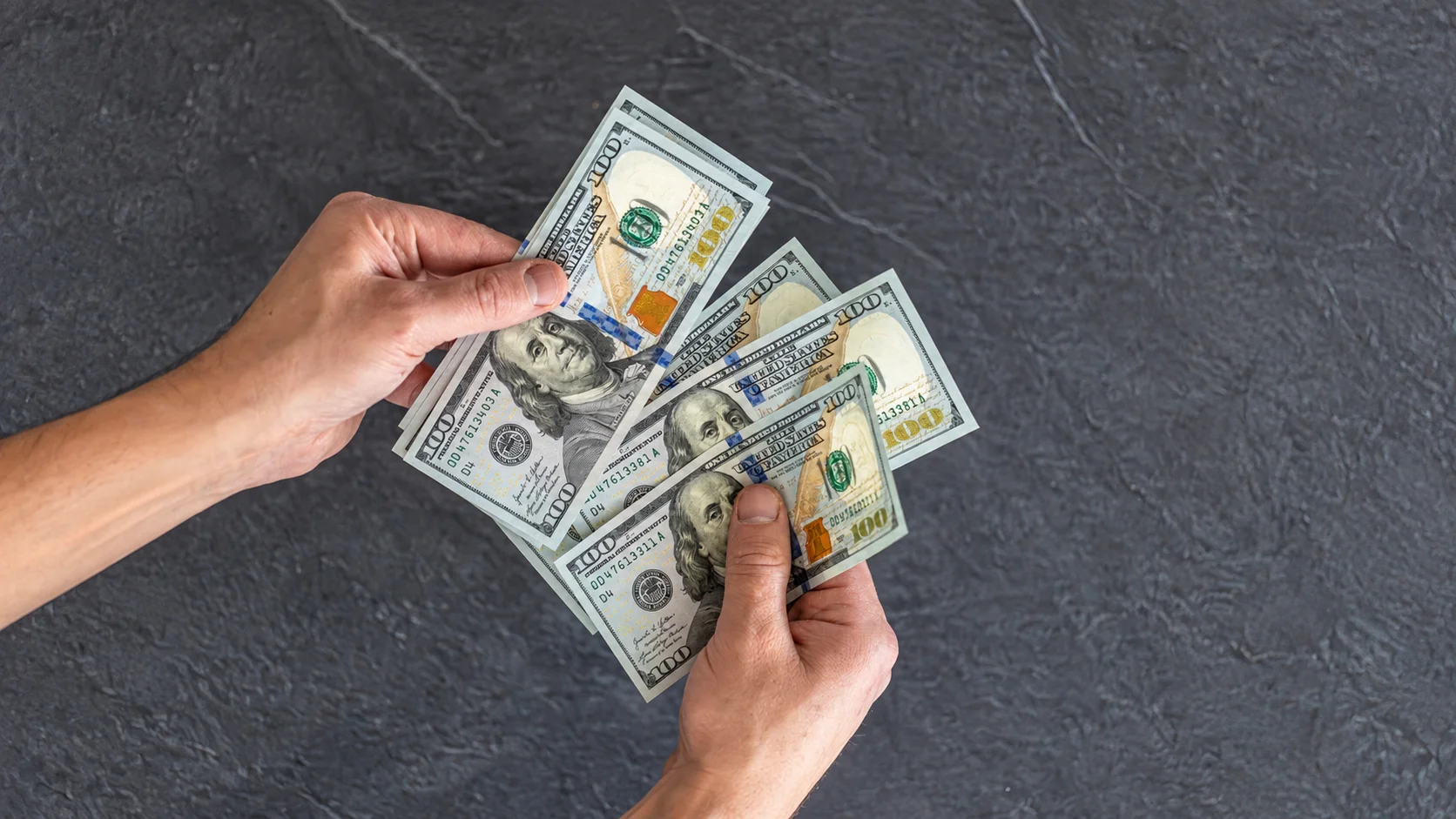 Hands with Dollars
